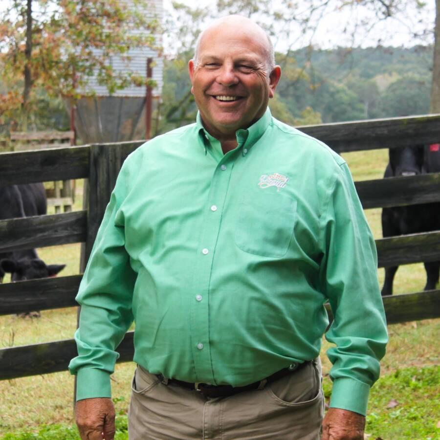 Zippy Duvall standing on his farm.